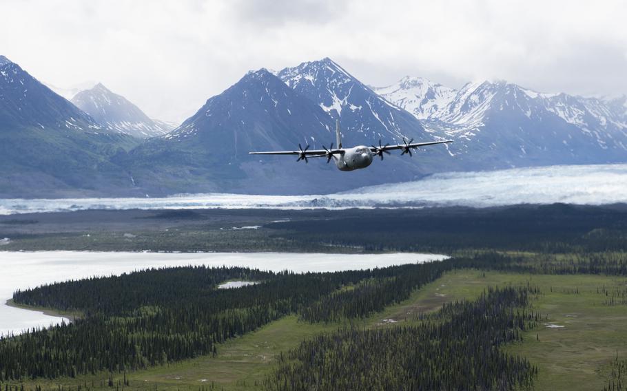 A U.S. Air Force C-130J Super Hercules from the 39th Airlift Squadron, Yokota Air Base, Japan, performs low-level maneuvers during an exercise over Alaska, June 25, 2021. The Defense Department's latest regional center, focused on the Arctic, will be located in Anchorage. 
