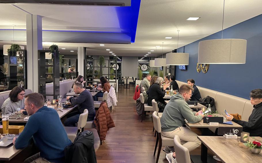 Customers dine on a busy Saturday night in November at Kiko in Kaiserslautern, Germany. The restaurant has garnered a lot of praise in online reviews since opening earlier this year. 