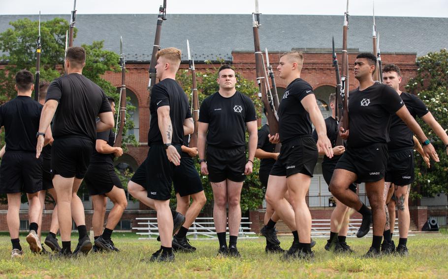 Soldiers rehearse drill movements