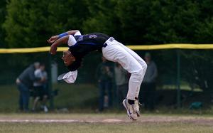 Ramstein pitcher Christian Roy flips after he struck out a Kaiserslautern batter for the final out during the Division I title game at the 2025 DODEA European baseball championships on May 23, 2025, at Southside Fitness Center on Ramstein Air Base, Germany.
