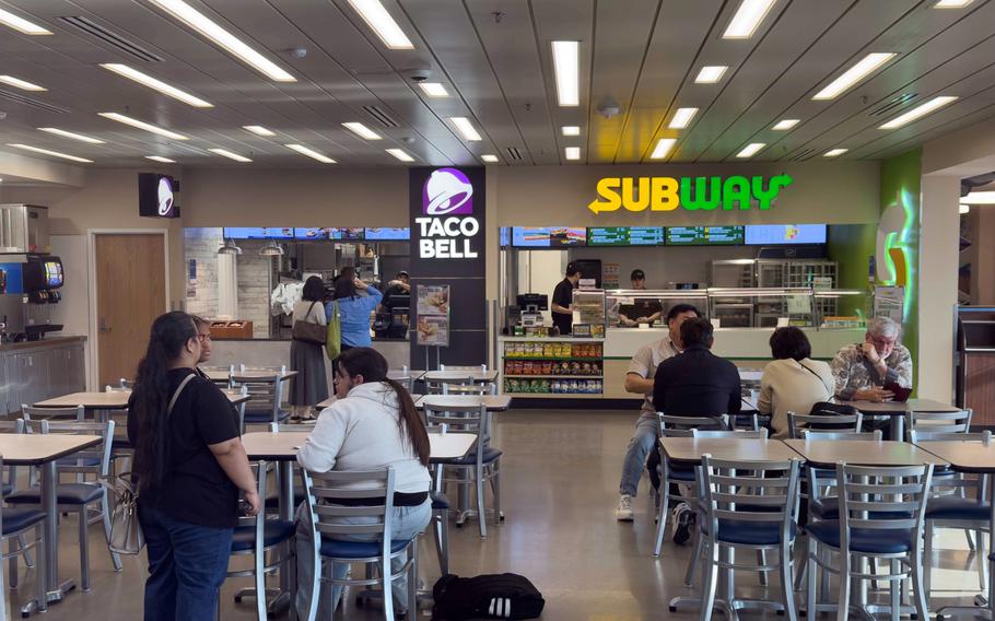 Patrons try out a newly renovated food court.