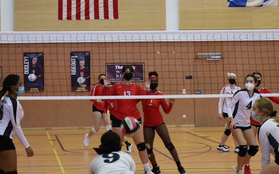 Hohenfels’ Kennedy Liverpool, left-center, returns a ball during a volleyball match against Kaiserslautern at Vilseck, Germany, Saturday, Oct. 9, 2021.