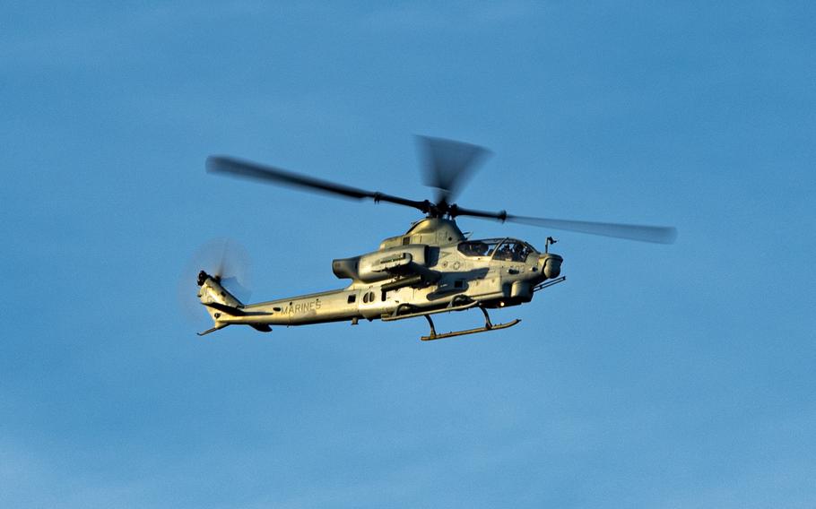 A U.S. Marine Corps AH-1Z helicopter conducts close fire support at Joint Base McGuire-Dix-Lakehurst, N.J., Dec 11, 2020. The AH-1Z provided close fire support with 2.75 inch HE rockets and .50 caliber GAU-21 single barrel rapid-fire machine guns. 