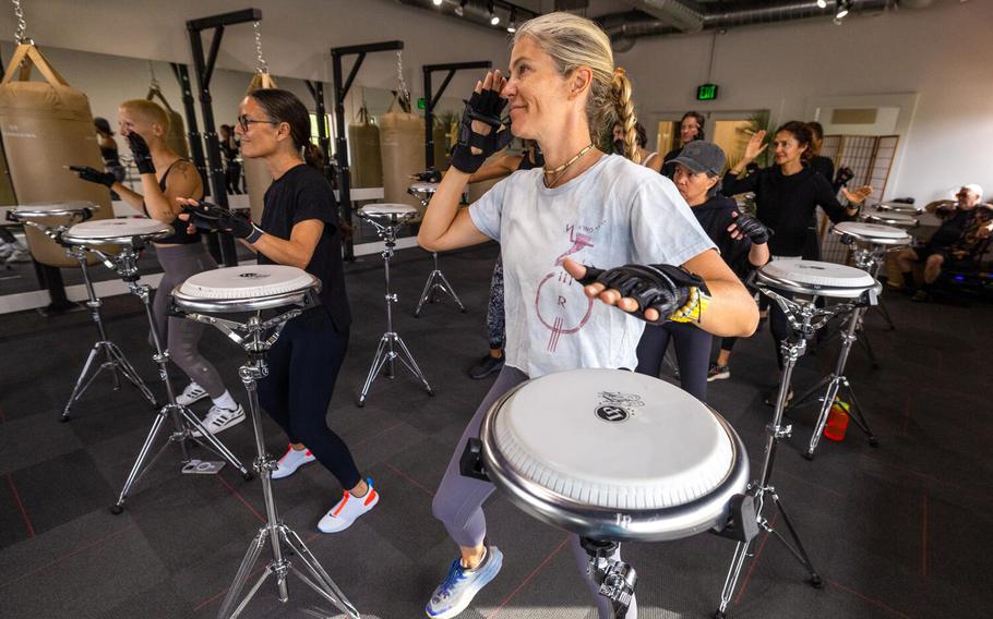 Drumboxing class members exercise with instructor John Wakefield on Oct. 25 in Malibu, Calif. Wakefield says Drumboxing is designed to induce mistakes, “to push you to a border of achievement and failure, floating back and forth. And it’s about getting past those mistakes and learning to move forward rather than be perfect,” an adaptability skill that can be applied to the real world. 