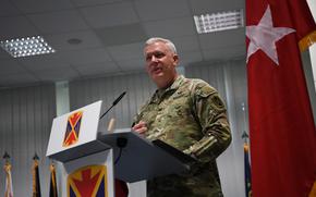 Col. Bruce A. Bredlow speaks at Sembach Kaserne after assuming command of the 52nd Air Defense Artillery Brigade, which was activated on Thursday, Oct. 6, 2022. 