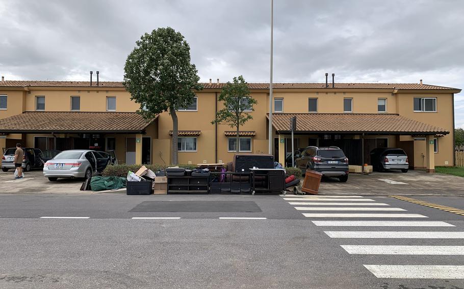 Residents of the Marinai housing complex on Naval Air Station Sigonella were pulling out damaged furniture and other items, Oct. 30, 2021, from homes that were flooded. The base had 68 units, seven of which were unoccupied, damaged by floodwaters earlier in the week. 