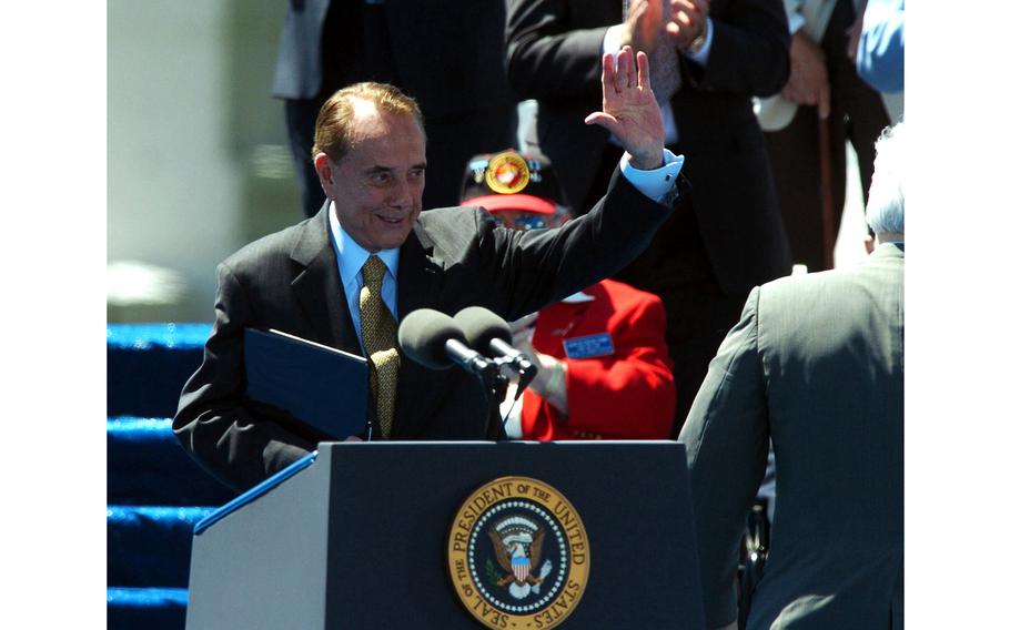 Former U.S. Senator and World War II veteran Bob Dole speaks at the dedication of the World War II Memorial on May 29, 2004, in Washington. 