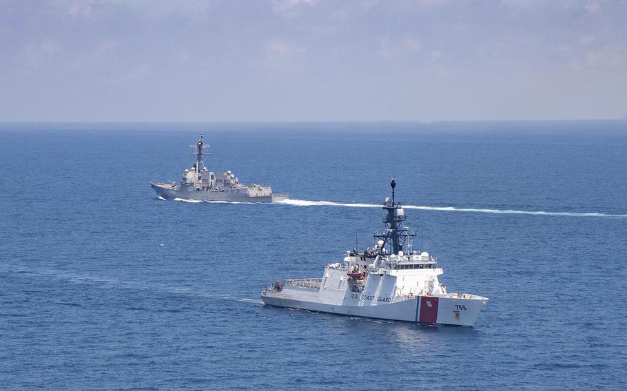 Legend-class U.S. Coast Guard National Security Cutter Munro (WMSL 755) transits the Taiwan Strait on Aug. 27, 2021, during a routine transit with Arleigh-burke class guided-missile destroyer USS Kidd (DDG 100).