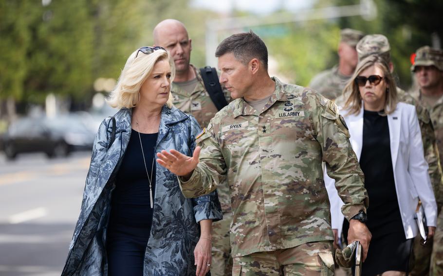 Army Secretary Christine Wormuth speaks with Maj. Gen. Joseph Ryan, commanding general of the 25th Infantry Division, during her visit to Schofield Barracks, Hawaii, on Jan. 24, 2023. 