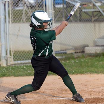 Kubasaki's Mia Vedsted rips one of her three hits against Kadena during Thursday's DODEA-Okinawa softball game. Her loop single down the third-base line in the bottom of the seventh capped the Dragons' eight-run rally to edge the Panthers 21-20.