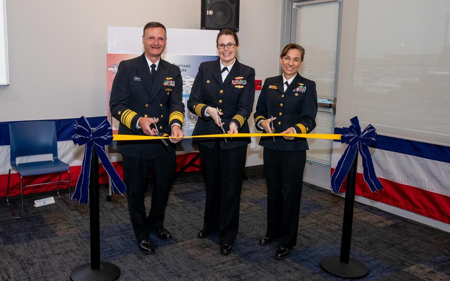 Vice Adm.l William Galinis, Commander, Naval Sea Systems Command; Capt. Dianna Wolfson, Norfolk Naval Shipyard Commander; and Rear Adm. Maria “Lore” Aguayo, Commander, Naval Facilities Engineering Systems Command Atlantic, cut the ribbon for Norfolk Naval Shipyard’s new Production Training Facility on Nov. 30, 2022.