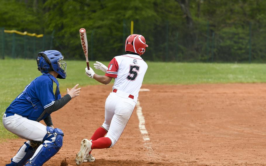 Kaiserslautern's Philip Stacey takes off for first while batting against Ramstein in a game Saturday, April 30, 2022, in Kaiserslautern, Germany. 