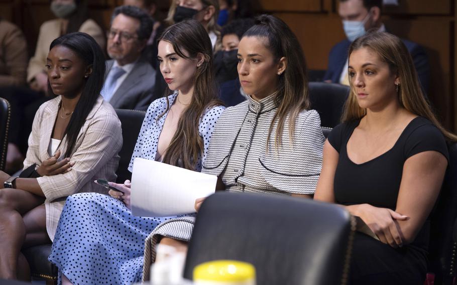 United States gymnasts from left, Simone Biles, McKayla Maroney, Aly Raisman and Maggie Nichols, arrive to testify on Capitol Hill in Washington on Wednesday, Sept. 15, 2021, during a hearing about the FBI’s handling of the Larry Nassar investigation. Nassar is now serving decades in prison after hundreds of girls and women said he sexually abused them under the guise of medical treatment when he worked for Michigan State and Indiana-based USA Gymnastics, which trains Olympians.