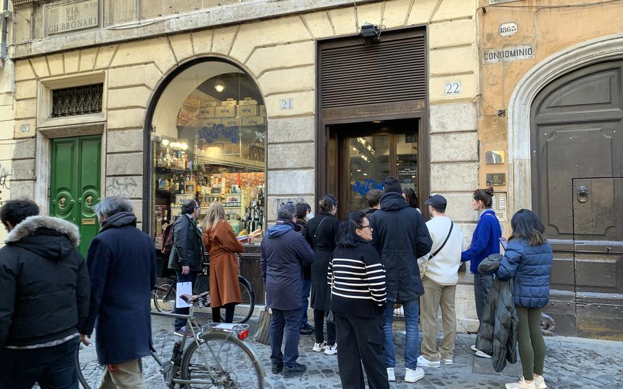 Crowds of hungry patrons without a reservation can wait an hour or more at Roscioli salumeria con cucina in Rome.