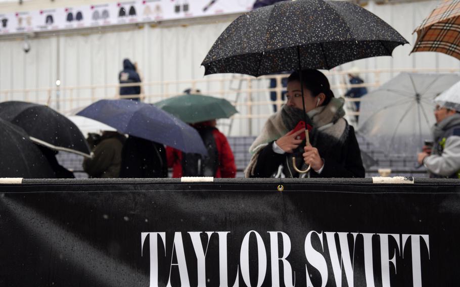 Taylor Swift fans line up outside Tokyo Dome to buy the pop star's official merchandise, Monday, Feb. 5, 2024. 