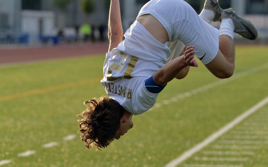 Ramstein’s Keiran Goodall does a flip after scoring the second goal in the Royals’ 2-0 win over Stuttgart in the Division I boys final at the DODEA-Europe soccer championships in Ramstein, Germany, May 22, 2025. 