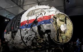 FILE - This Tuesday, Oct. 13, 2015 file photo, shows the reconstructed wreckage of Malaysia Airlines Flight MH17, put on display during a press conference in Gilze-Rijen, central Netherlands. The Netherlands and Ukraine argued Wednesday, Jan. 27, 2022, that a top European court should hear their cases that seek to hold Russia responsible for human rights violations in eastern Ukraine including the 2014 downing of a passenger jet that killed all 298 people on board. (AP Photo/Peter Dejong, File)