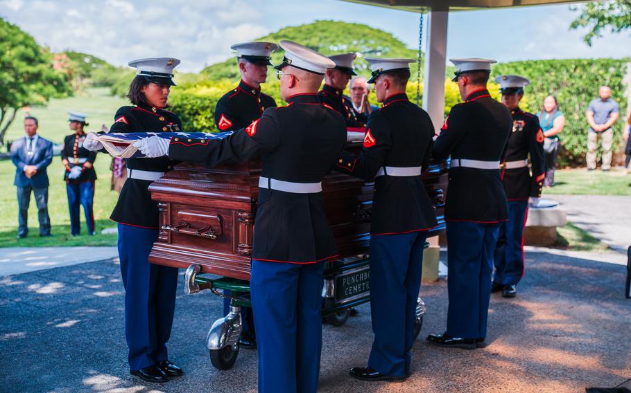 U.S. Marines, assigned to Headquarters Battalion, Marine Corps Base Hawaii, and members of the Defense POW/MIA Accounting Agency (DPAA) conduct an interment ceremony held at the National Memorial Cemetery of the Pacific, Honolulu, , Oc. 16, 2023. DPAA and attending family members paid their respects and honored the life of U.S. Marine Corps Sgt. Arthur B. Ervin, 22, killed during World War II.