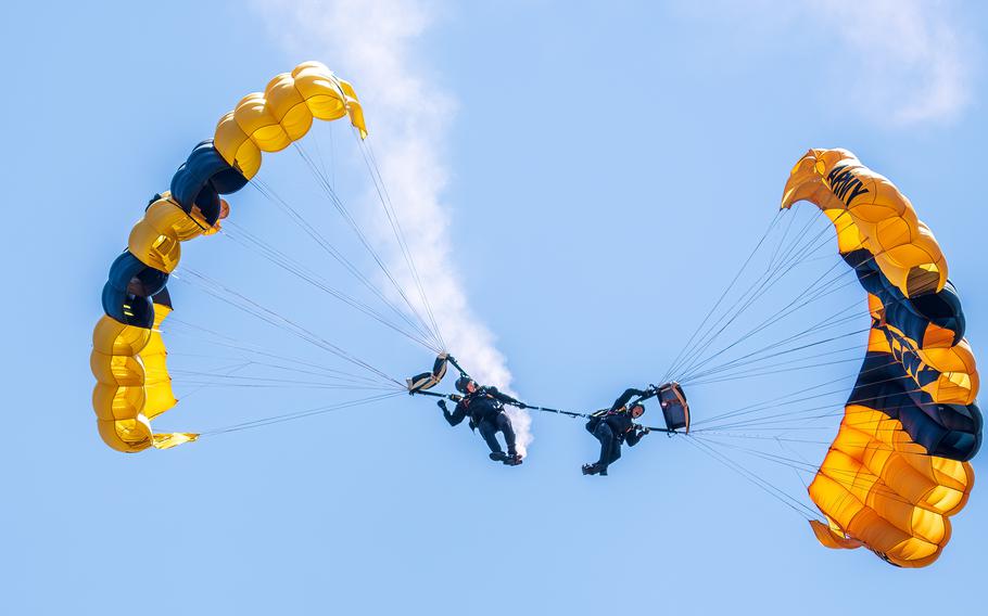 Sgt. 1st Class Ty Kettenhofen and Staff Sgt. Griffin Mueller of the U.S. Army Parachute Team perform an advanced canopy maneuver for a demonstration jump at Selfridge Air National Guard Base, Mich., during the Selfridge Open House and Air Show, July 10, 2022. Kettenhofen was killed during a training jump at Homestead Air Reserve Base in Florida, Monday, March 13, 2023.