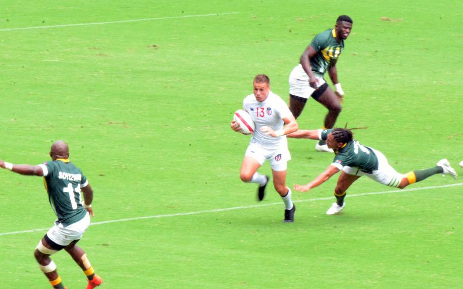 Former Army specialist Cody Melphy advances the ball during the U.S. Eagles’ Olympic rugby sevens game against South Africa, Tuesday, July 27, 2021. 