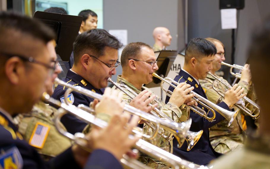 Members of the U.S. Army Japan and Japan Ground Self-Defense Force bands practice at Camp Zama, Japan, Dec. 13, 2023.  