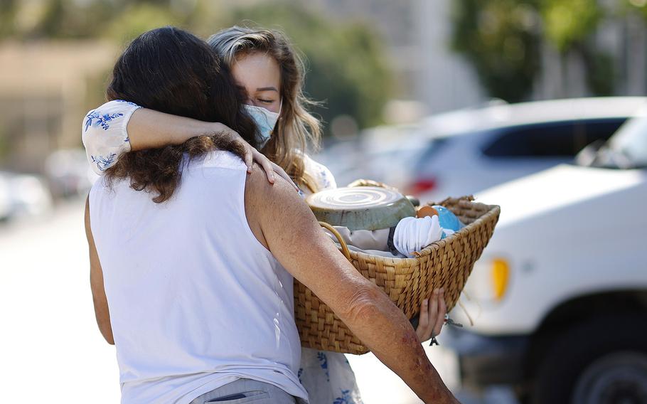 Hope Shaw, Navy veteran and housing specialist for PATH (People Assisting The Homeless), brings household items to Bruce Blackham who she recently found housing for on Monday, Sept. 19, 2022, in San Diego, California. An Emergency Housing Voucher funded by the American Rescue Plan Act was used to secure an apartment for him.