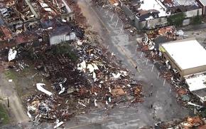 This image taken from video provided by KOCO shows damage caused by a tornado in Sulphur, Okla., Sunday, April 28, 2024.