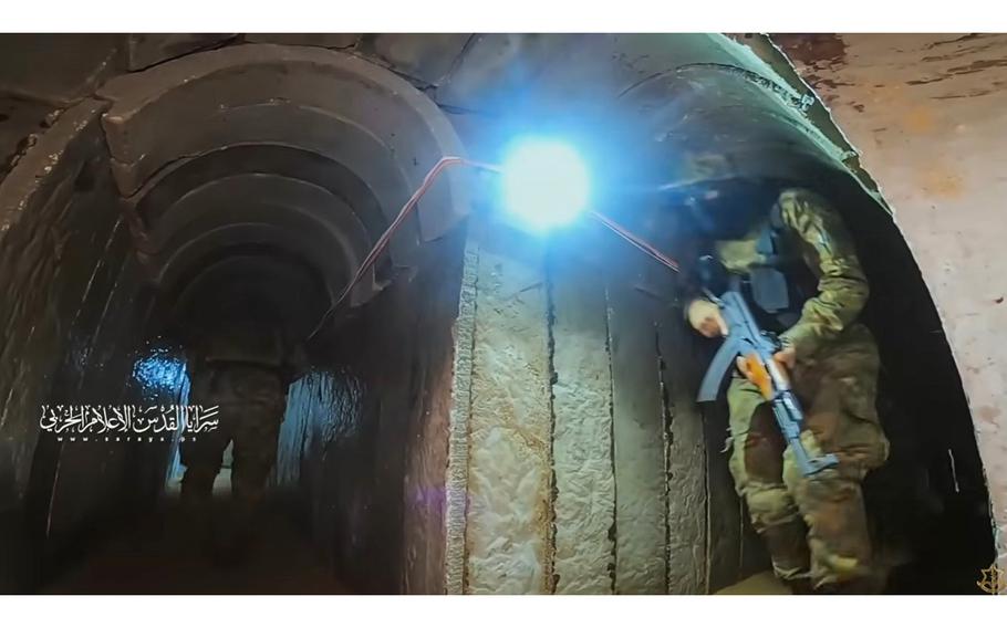 A video screen grab shows militants navigating through tunnel networks in Gaza.
