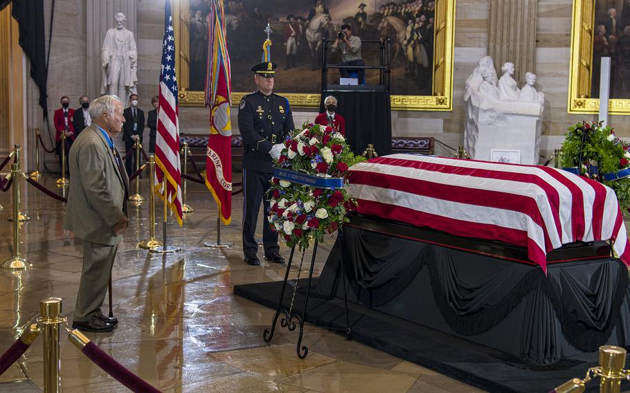 Medal of Honor recipient Harvey C. "Barney" Barnum Jr., observes a moment of silence as he pays his respects before the casket of World War II Medal of Honor recipient Hershel Woodrow "Woody" Williams, who was lying in honor at the U.S. Capitol in Washington, on July 14, 2022.
