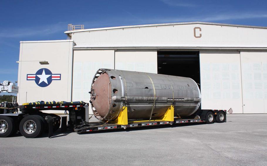 A portion of the first-stage booster used during the Gemini-Titan 5 mission that launched astronauts Pete Conrad and Gordon Cooper into space on Aug. 21, 1965, was hauled to its new home at the Cape Canaveral Space Force Museum.