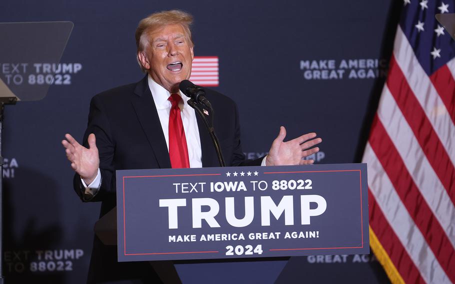 Republican presidential candidate, former President Donald Trump speaks during a campaign event at the Hyatt Hotel on Dec. 13, 2023, in Coralville, Iowa. 
