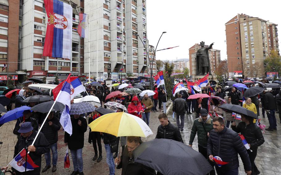 Kosovo Serbs wave Serbian flags during a protest in Mitrovica, Kosovo, Nov. 6, 2022. Several thousand ethnic Serbs on Sunday rallied in Kosovo after a dispute over vehicle license plates triggered a Serb walkout from their jobs in Kosovo’s institutions and heightened ongoing tensions stemming from a 1990s conflict.