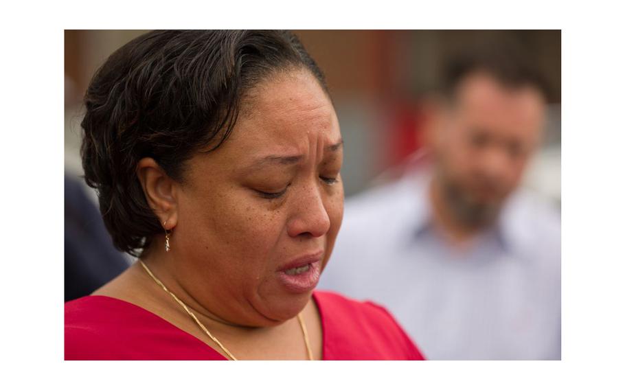 Michele Brooks, widow of deceased Newark firefighter Wayne Brooks Jr., who died while battling a cargo ship fire in Port Newark this summer, speaks at a press conference in Newark on Friday Oct. 6, 2023.