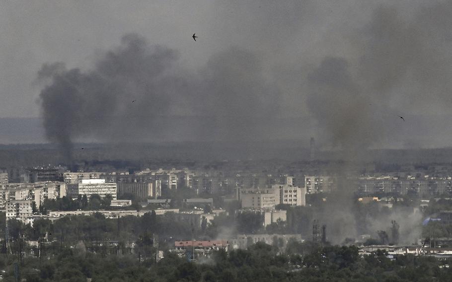 Smoke and dirt rise from the city of Severodonetsk in the eastern Ukrainian region of Donbas on June 17, 2022, as the Russian-Ukraine war enters its 114th day. 