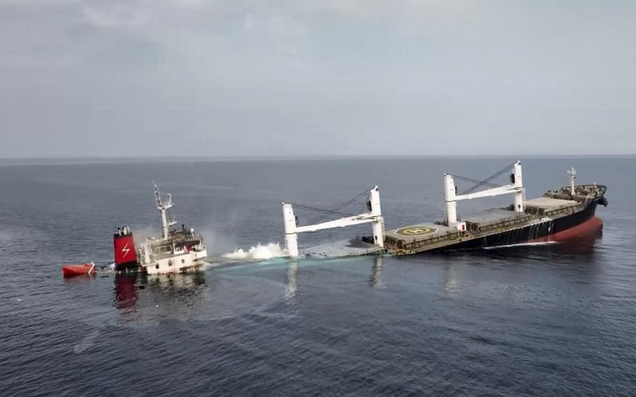 A ship sinks into the sea.