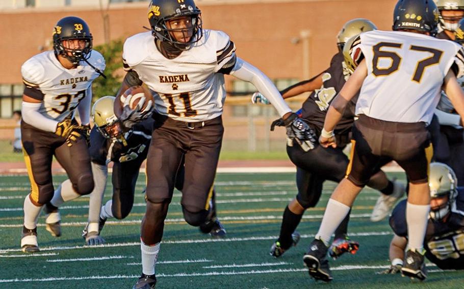 Kadena's Sadiq Haynes looks for open space against Humphreys.