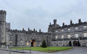Exterior of Kilkenny Castle on a cloudy day
