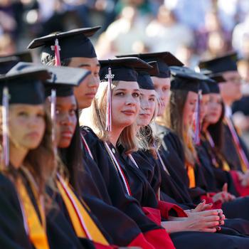 Kaiserslautern High School seniors attend their school’s graduation ceremony on Wednesday, June 1, 2022, at Raider Stadium, in Kaiserslautern, Germany.