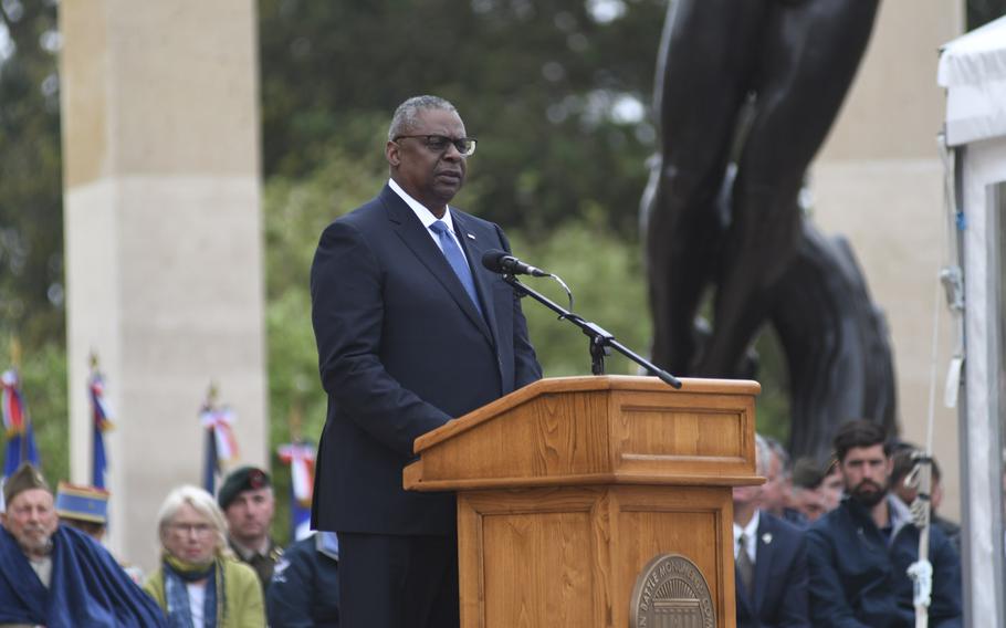 Defense Secretary Lloyd Austin speaks at the D-Day anniversary ceremony at Normandy American Cemetery on Tuesday, June 6, 2023. “The eyes of the world are still upon the heroes of D-Day,” he said. “To the veterans of World War II: We salute you. You saved the world.”