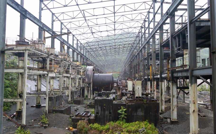 Rusting machinery at the long-shuttered Panguna mine. Restarting the massive operation after 35 years of dormancy will cost at least $3 billion or $4 billion, experts say. 