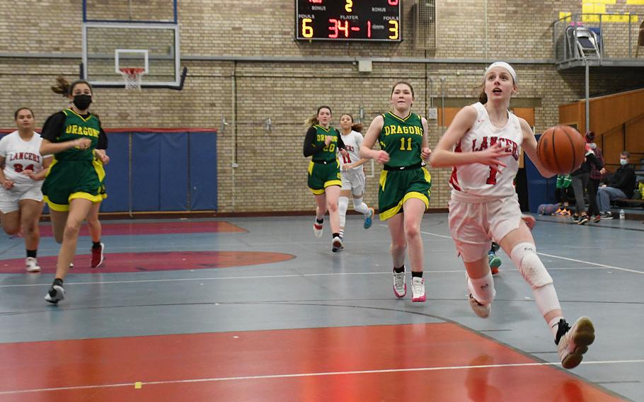 Lakenheath's Jesse Moon, who led her team with 18 points, drives the ball for a layup on a breakaway during a game Tuesday, Jan. 18, 2022, against Alconbury. 