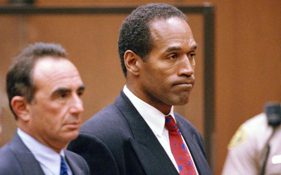 O.J. Simpson listens to a decision on July 8, 1994, during his trial in the slayings of his ex-wife Nicole Brown Simpson and Ronald Goldman. Simpson.