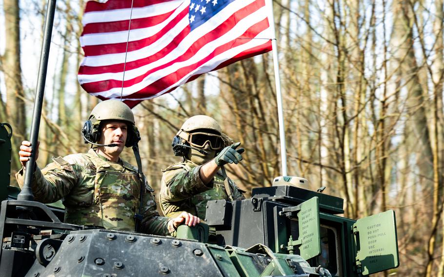 Soldiers conduct a movement with armored vehicles and tanks March 5, 2024, near the Vistula River in Poland during Exercise Dragon 24. The Center for Strategic and International Studies, in a report released Monday, said the U.S. Army should permanently station a brigade in Poland and maintain a similar rotational force in Romania to bolster NATO's defenses.