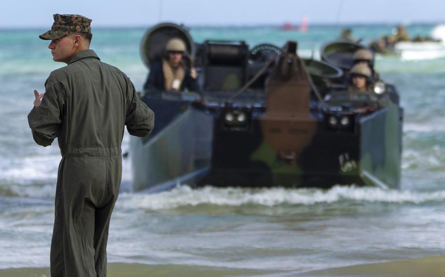 Marines from Company B, 3rd Assault Amphibian Battalion train in assault amphibious vehicles at Camp Schwab, Okinawa, June 2, 2021.