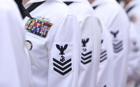 FILE - Enlisted sailors line up and wait to march on the field at Sun Life Stadium before the NFL football game in Miami, Nov. 13, 2011, between the Washington Redskins and Miami Dolphins. The Navy will begin randomly testing its special operations forces for steroids and other performance-enhancing drugs beginning in November, taking a groundbreaking step that military leaders have long resisted. Rear Adm. Keith Davids, commander of Naval Special Warfare Command, announced the new program Friday, Sept. 29, 2023, in a message to his force, calling it necessary to protect their health, safety and military readiness.  (AP Photo/J Pat Carter, File)