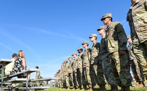 Family members watch their soldiers graduate from the Army’s Basic Airborne Course at Fort Benning, Ga. on Friday, May 21, 2021. It marked the first airborne school graduation open to family and loved ones since the beginning of the coronavirus pandemic. (Corey Dickstein/Stars and Stripes)