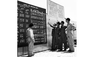 Hed: USAFE Air Weapons Meet, 1955

Wheelus Field, Libya, August, 1955: Pilots gather around the scoreboard during the first annual U.S. Air Forces in Europe gunnery meet. The event was run in three phases: Air-to-air and air-to-ground firing; special weapons; and rocket competition. Each team of six planes was allowed 5,000 pounds of logistic equipment and 25 supporting personnel.

Looking for Stars and Stripes’ coverage of overseas military life through the decades? Subscribe to Stars and Stripes’ historic newspaper archive! We have digitized our 1948-1999 European and Pacific editions, as well as several of our WWII editions and made them available online through https://starsandstripes.newspaperarchive.com/

META TAGS: military sports; North Africa; U.S. Air Force; USAFE Air Weapons Meet; 