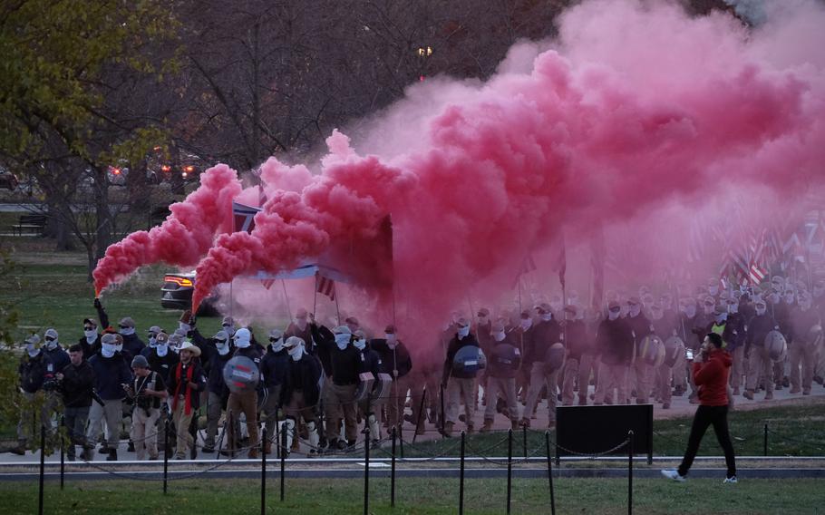 Members of Patriot Front march down the National Mall on Dec. 4, 2021 in Washington D.C. 