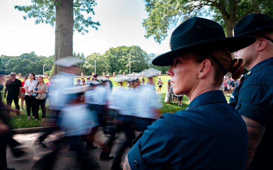 Coast Guard Chief Petty Officer Tiffany Moore watches as the newly sworn in Coast Guard Academy Class of 2028 marches, July 1st 2024.