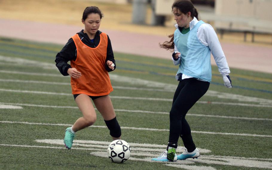 Aubrey Oh, left, is a freshman but not new to soccer, having played since she was little. Alas, she will only be with Yokota's girls soccer team for one season.